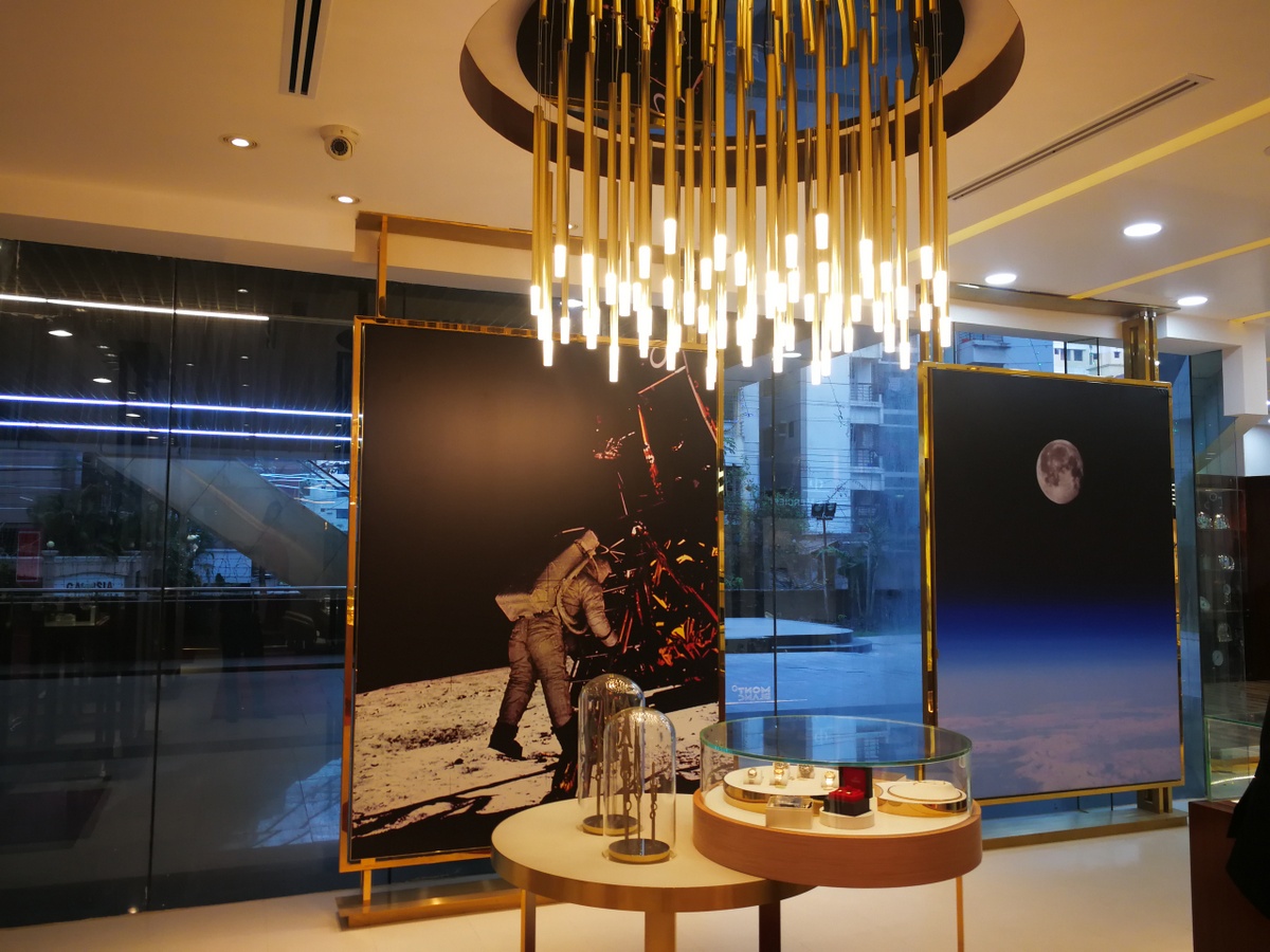 A watch movement being assembled by a watchmaker.